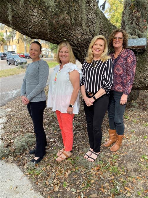 Vocational Rehab Employment Specialists Picture under a large oak tree. 