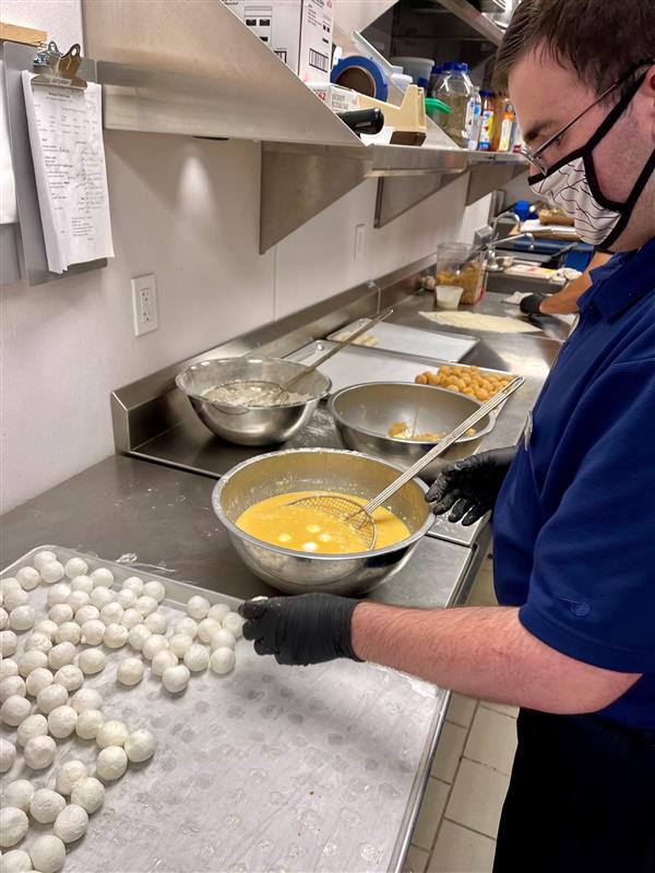 Student preparing food