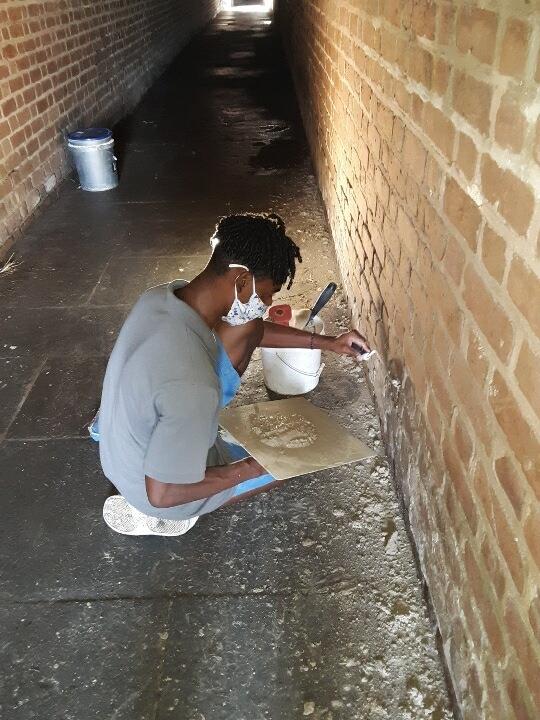 Transition Student performing masonry work