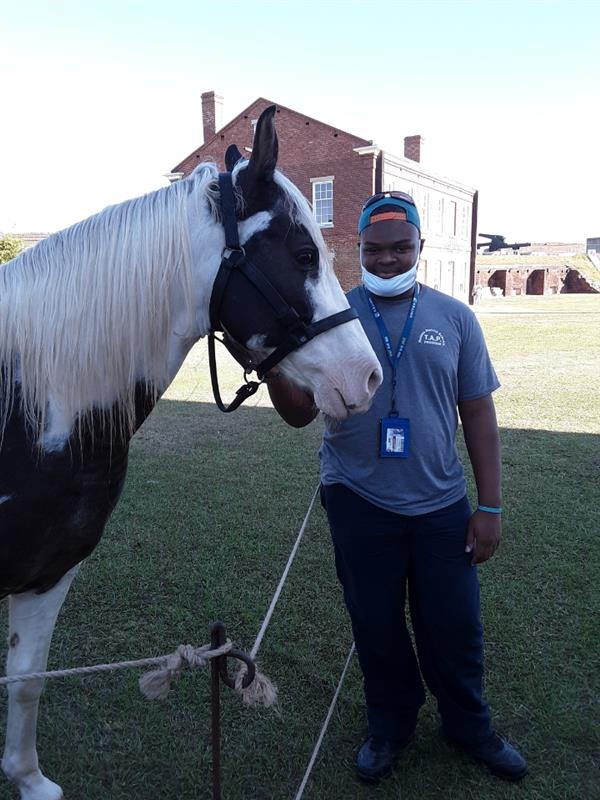 Student and horse at the Farm